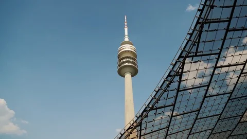 Walking along Olympic park in Munich, Germany, summer time, gimbal shot. Stock Footage 125249792
