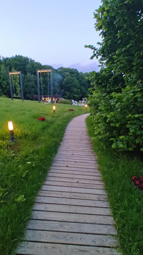 Walking along the path in the evening. 動画素材 310694320