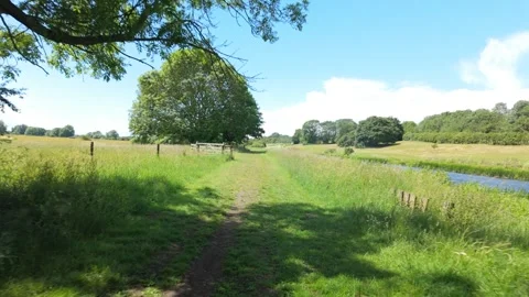 Walking along the river nene at ferry meadows Stock Footage 339799060