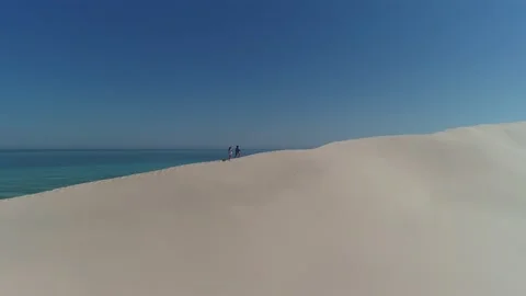Walking Along Sand Dunes Stock Footage 158660209