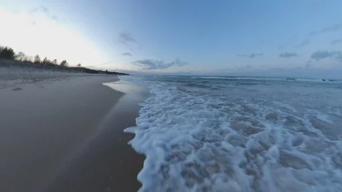 Walking Along Sandy Beach Baltic Sea at Sunset POV Stock Footage 125007449