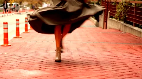 Walking along the sidewalk, the girl that started to dance Stock Footage 48229846