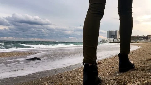 Walking Along Winter Beach. slow motion Stock Footage 81660817