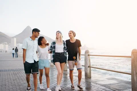 Walking alongside the ocean Stock Photos