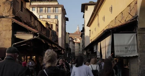 Walking among people On Ponte Vecchio in Florence Stock Footage 197491714
