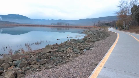 Walking and bike path along the beautiful Lake.Footpath Along the Pond. Stock Footage 129821973