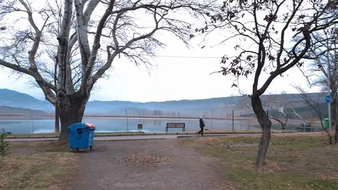 Walking and bike path along the beautiful Lake.Footpath Along the Pond. Stock Footage 129824243