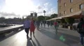 Walking and riding bicycles on the seafront in Barcelona 4k or 4k+ Resolution