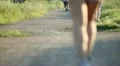 Walking and riding on bike in the park HD Footage
