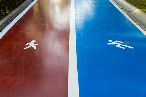 Walking and Running Path with Divided Lanes Stock Photos