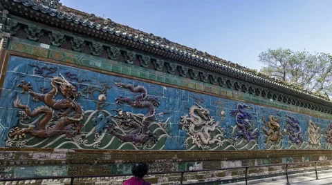 Walking and seeing the Nine Dragons Screen in Beihai Park, Beijing, China Video stock 67516685