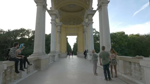Walking and sitting under the Gloriette arcades at Schönbrunn Palace, Vienna Stock Footage 61440610