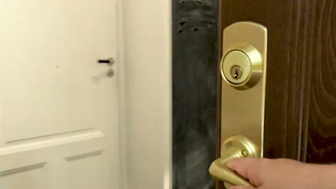 Walking into an apartment through the front door Stock Footage 137462222