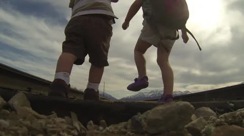 Walking away down railroad tracks. Stock Footage 23053085