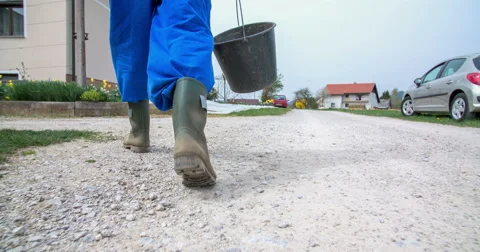 Walking back to the front yard of his house Stock Footage 62402629