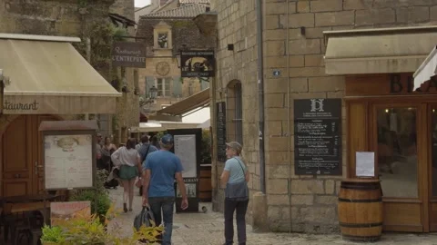 Walking the back lanes of the pretty old town in Sarlat-la-Canéda Stock Footage 292639468