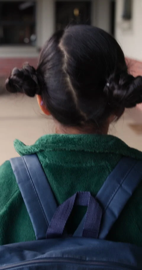 Walking, back or girl with backpack in school for curriculum, academic Stock Footage 335906671