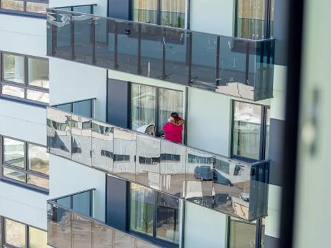 Walking on balcony Stock Photos