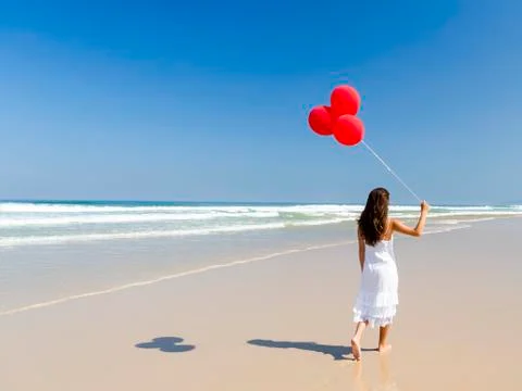 Walking with ballons Stock Photos