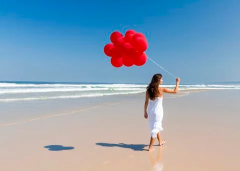 Walking with ballons Stock Photos