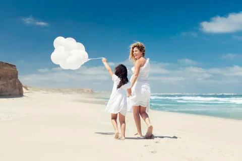 Walking with ballons Stock Photos