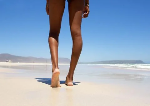 Walking barefoot on beach Foto stock