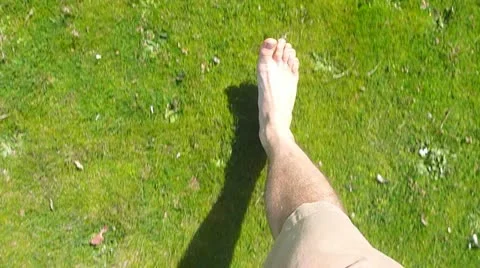 Walking Barefoot in Grass Stock Footage 22329995