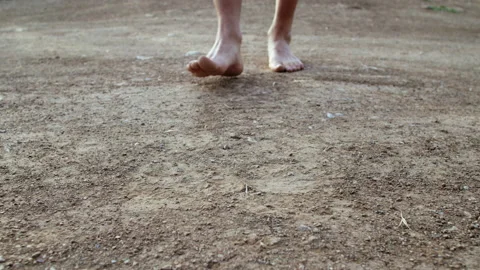 Walking barefoot on land Video stock 161469405