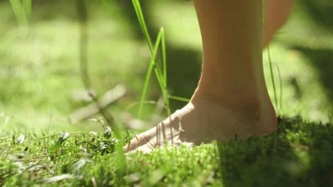 Walking barefoot on the moss Stock Footage 141888058