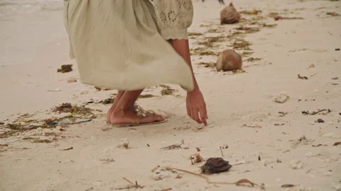 Walking barefoot on sandy shore. Strolling gently along warm coastal sands Stock Footage 341668645