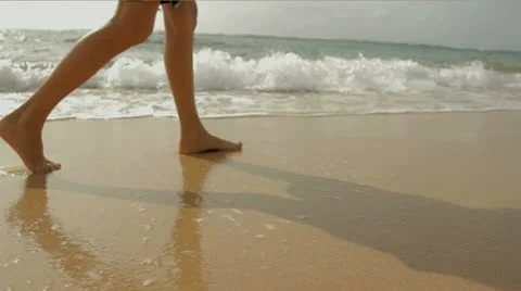 Walking on beach and water Stock Footage 10567107