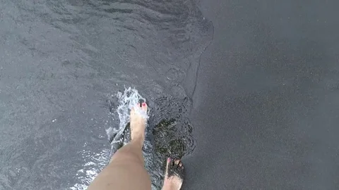 Walking on a beach with black sand on vulcano island Stock-Footage 80163767