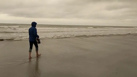 Walking on the beach coastline RAW footage Stock Footage 80204828