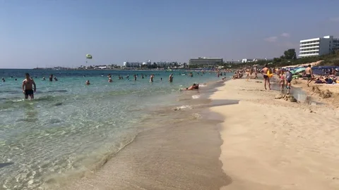 Walking at the Beach Filled with People Stock-Footage 117067413