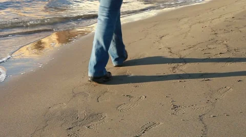 Walking on the beach Stock Footage 10709393