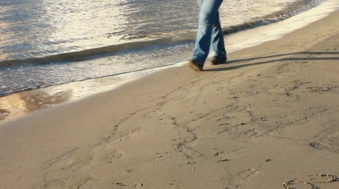 Walking on the beach Stock Footage 10709494