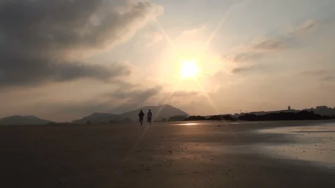 Walking in the beach Stock Footage 99399769