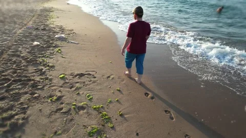 Walking on beach Stock Footage 222818517