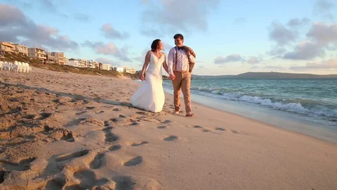 Walking On The Beach Holding Hands Stock-Footage 115323788