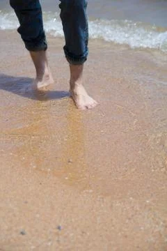 Walking on a beach Stock Photos