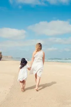 Walking on the beach Stock Photos
