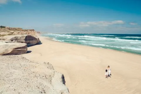 Walking on the beach Stock Photos