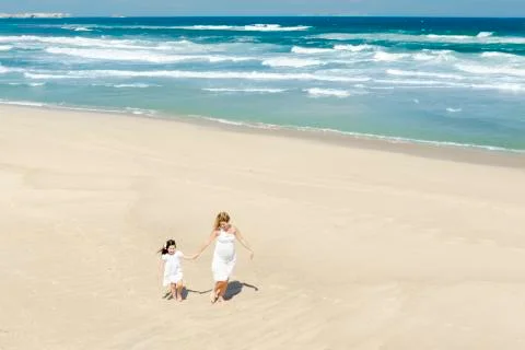 Walking on the beach Stock Photos