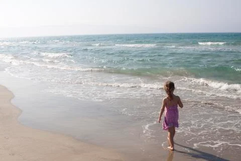 Walking on the beach Stock Photos
