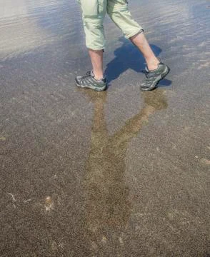 Walking on the beach Stock Photos