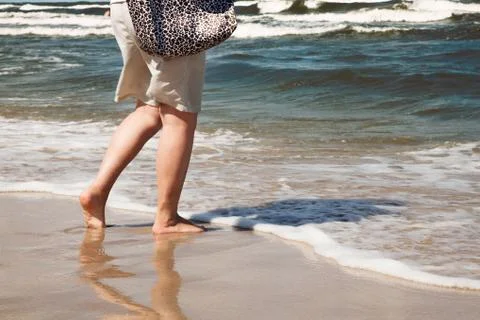 Walking on the beach Stock Photos
