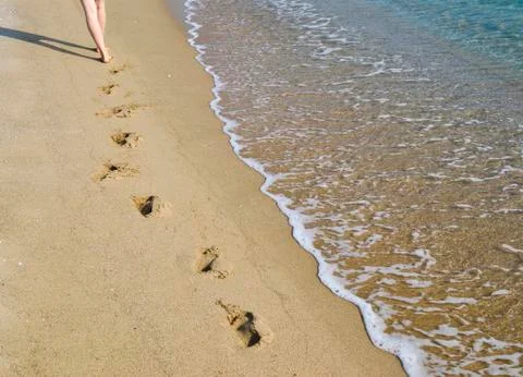 Walking on the beach Stock Photos