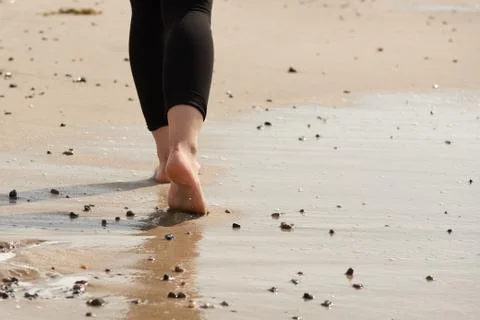 Walking on the beach Stock Photos