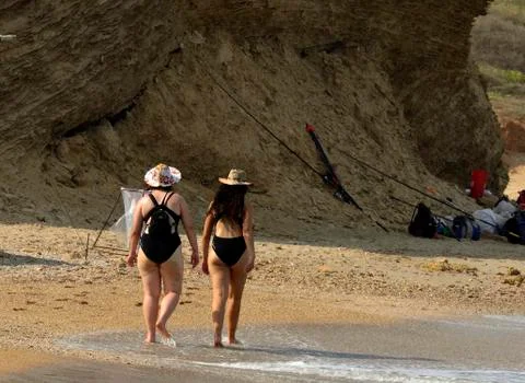 Walking on the beach Stock Photos