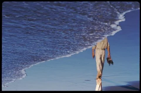Walking on Beach Stock Photos